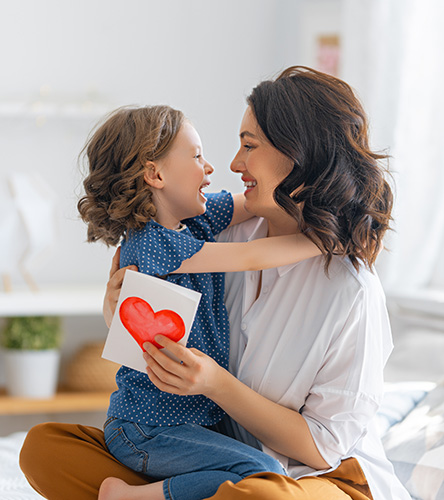 long island plumbing services - Paul's Way Home provides Long Island plumbing services to keep you family happy and health no matter what problem arises. A mother reads a card from her daughter.